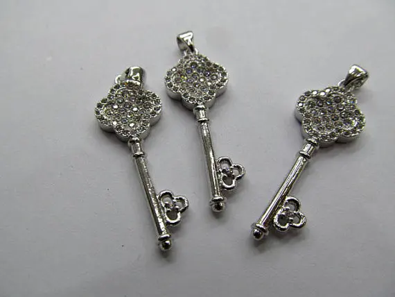 

fashion AAA grade 40x12mm 6pcs pave metal &cubic zirconia crystal rhinestone leaf key clove charm pendant