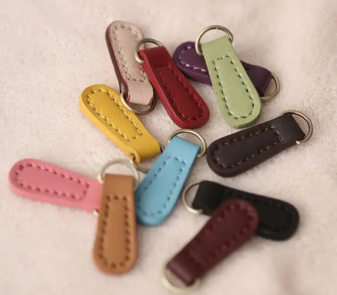 

Corium zipper Bags clothing fitting leather hand-stitched oval ring pull