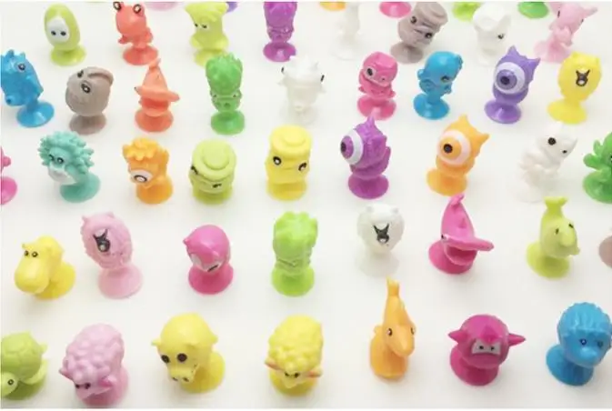 

10pcs/ The latest styles of small monsters, sucker dolls, cartoon aliens model toys
