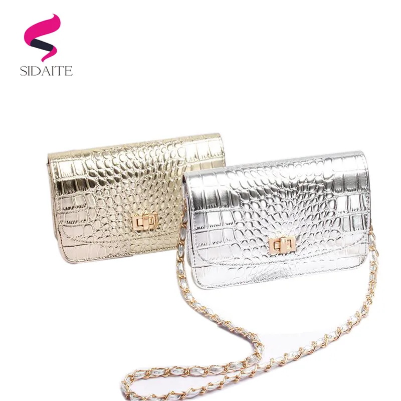 Женская сумка на плечо с цепочкой из крокодиловой кожи серебристого и золотого