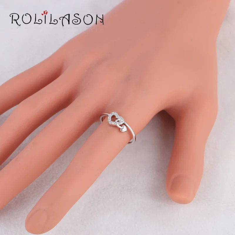 Кольцо ROLILASON в форме сердца серебристого цвета с белым кристаллом циркония