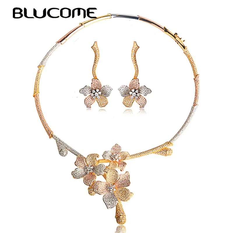 Женские серьги Blucome золотого цвета с медным цирконием и цветком в форме растений |