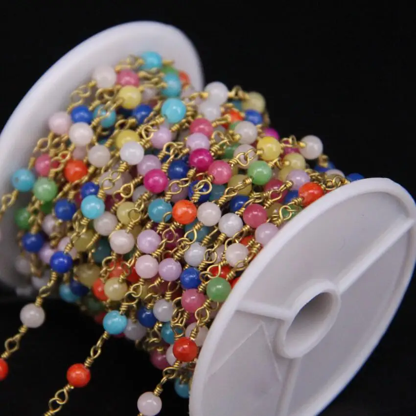 Разноцветные малайские яшмы 4 мм размеры разные цвета вокруг бусин обернутая