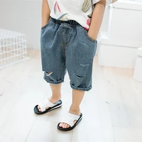 dfxd 2018 summer children girls boys ripped jeans high quality new loose denim blue soild color kids jeans baby fashion trousers