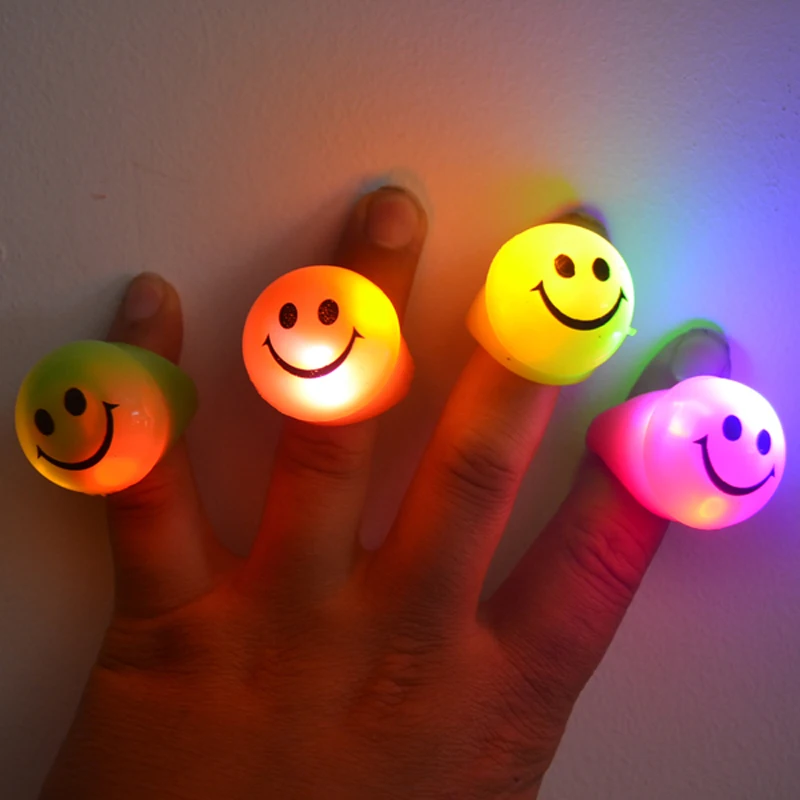

Free Shipping36pcs LED smiley finger ring Light Up Flashing Finger Ring Glow Kids Children Party Favors