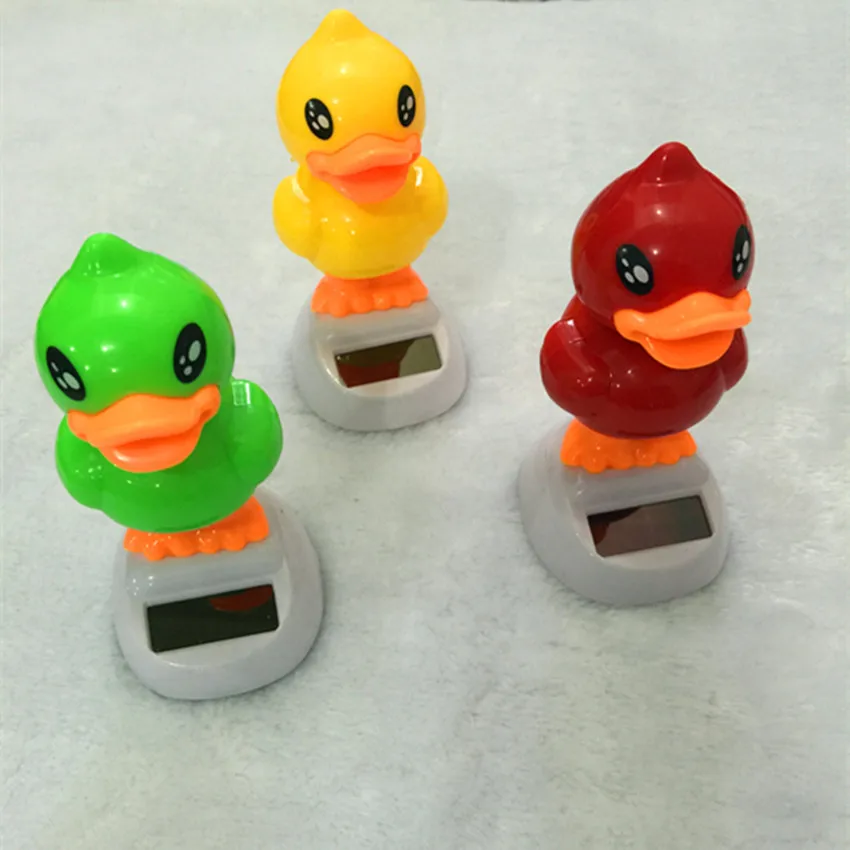 Вибрирующая голова ревеня утка украшение интерьера автомобиля на солнечной