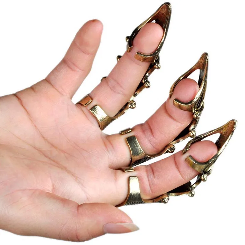 острые пальцы. металлические когти на пальцы. напальчник металлический. кольцо коготь готика. когти эвелин когти монстра.