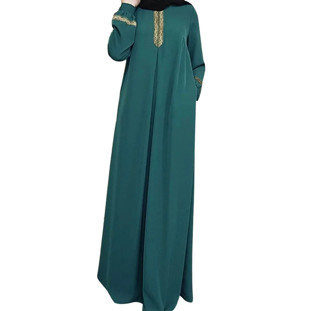 Длинное женское платье с длинным рукавом и вышивкой в этническом стиле