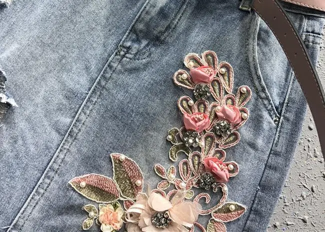 Женская джинсовая юбка с высокой талией асимметричная облегающая вышивкой и