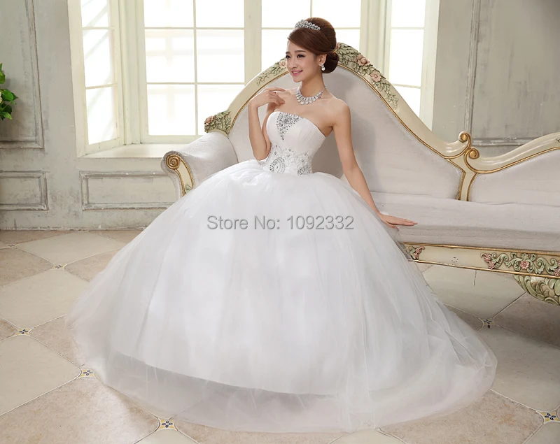 

t 2016 New stock bridal gown plus size women wedding dress bandage paillette lace up sleeveless appliques ball gown A68