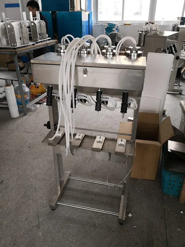 Новое поступление машина для наполнения перфурмом с 4 головками