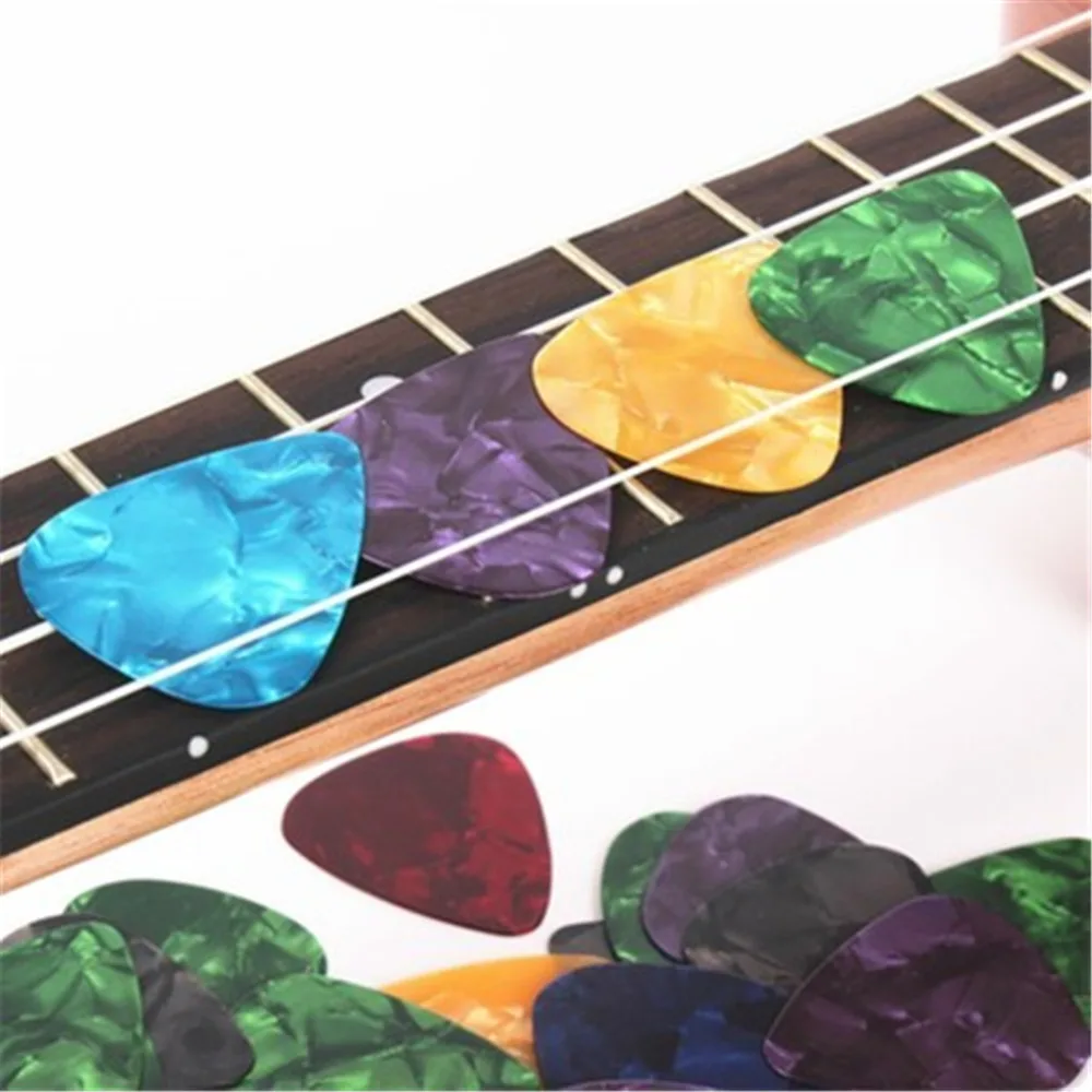 

100pcs/lot Celluloid Guitar Picks Plectrums Standard 0.38mm-0.8mm For Acoustic And Electric Guitar Bass Guitarra Pick