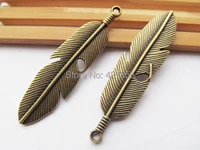 50pcs vintage antique silver toneantique bronze heavy filigree long feather pendant charmfindingdiy accessory jewellry making