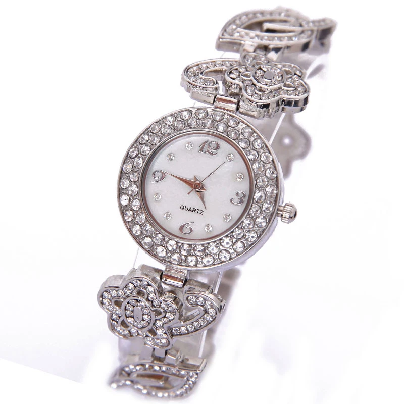 Женские кварцевые часы Gnova золотистые наручные с большими звездами и листьями из