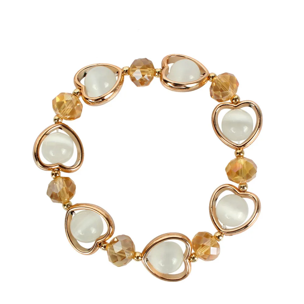 Женский браслет с подвесками украшенный кристаллами и бусинами подарочные