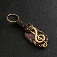 2022 fashion vintage brown genuine leather wing compass music symbol keychain charm handwork alloy accessories men key chain