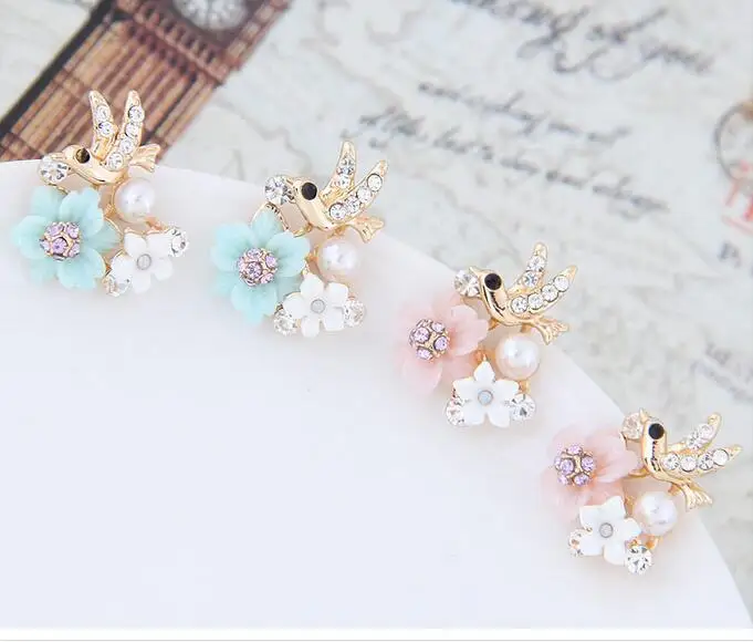 Женские серьги-гвоздики с кристаллами в виде птицы золотые и серебряные