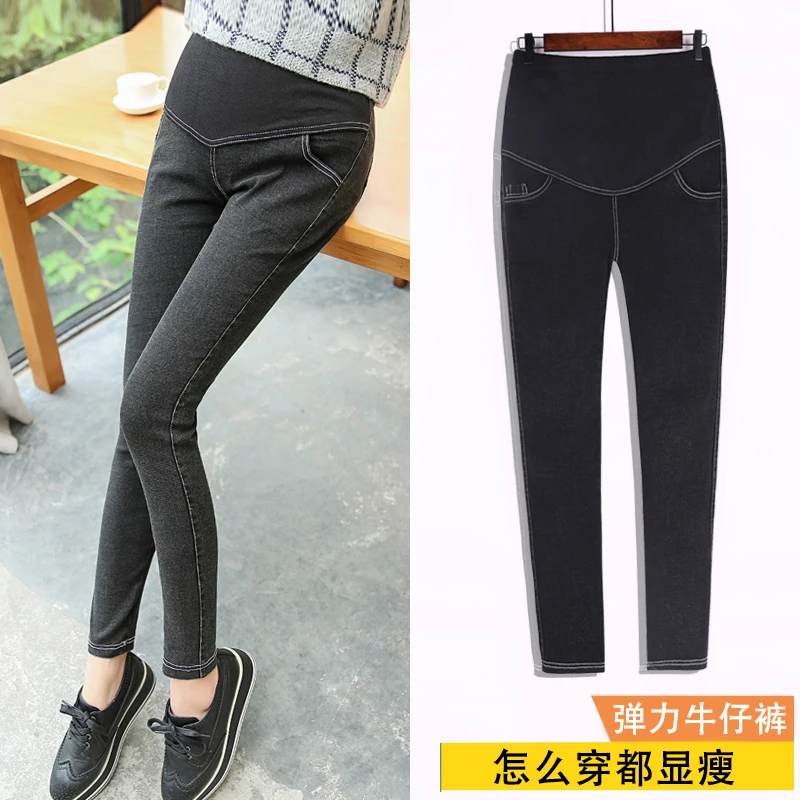 

The spring and autumn period and the model of washing water snow pants of pregnant women pregnant women jeans tap belly show thi