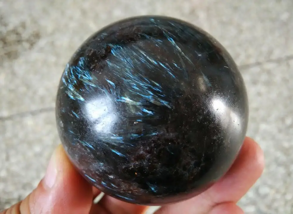 

280g Blue Flash Russian Astrophylite with Garnet and Pyrite Sphere Ball