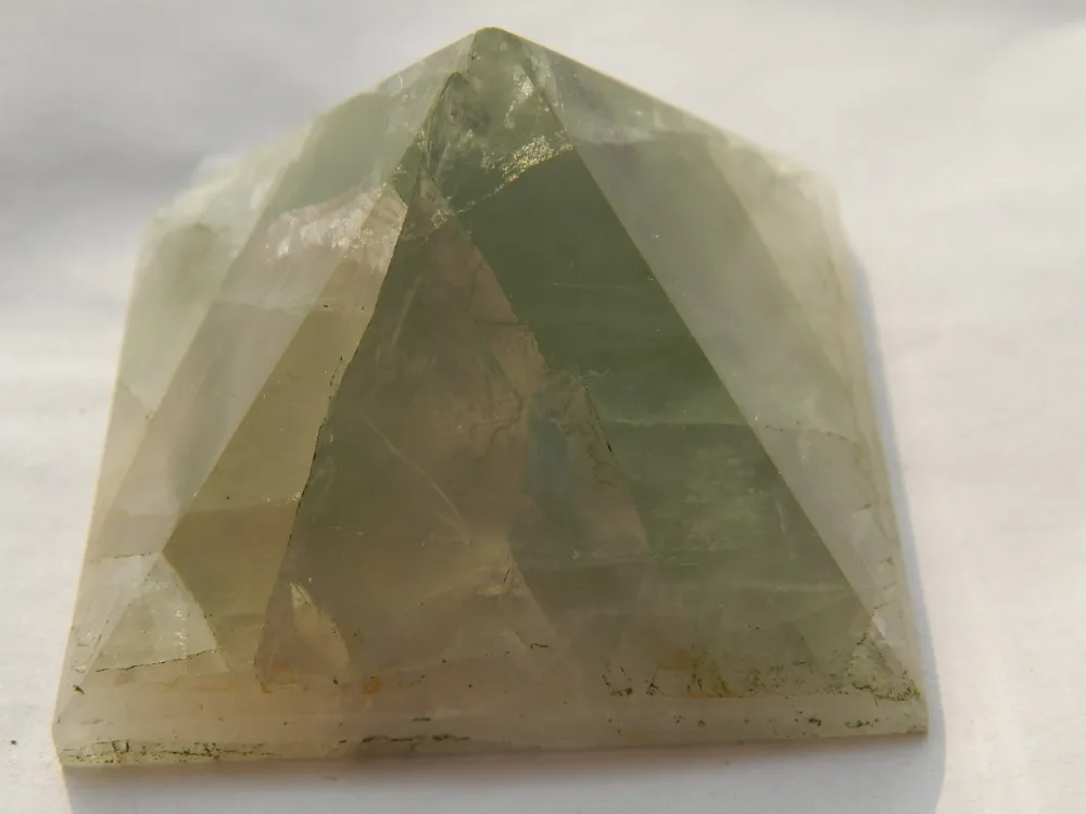 

Natural green fluorite.Quartz crystal pyramid POINT HEALING