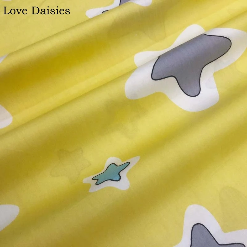 Саржевая ткань из 100% хлопка с серыми и желтыми большими звездами оранжевыми