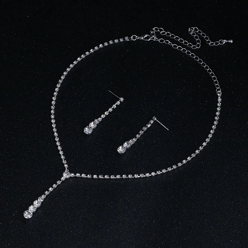 Комплект из колье серёг и браслета серебристого цвета|necklace earring bracelet set|crystal bridal