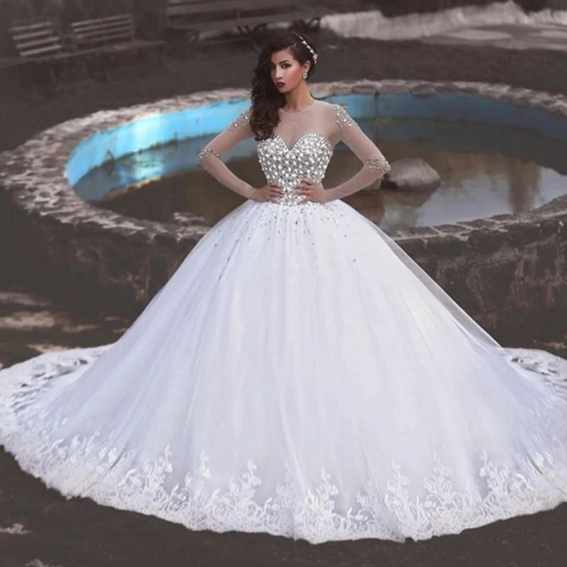 

2023 Luxury Ball Gown Wedding Dresses O Neck Long Sleeves Crystal Beaded Tulle Appliques Saudi Arabic Wedding Gowns Bridal Dress