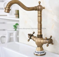 basin faucets antique brass bathroom sink faucet 360 degree swivel spout double cross handle bath mixer taps nnf602