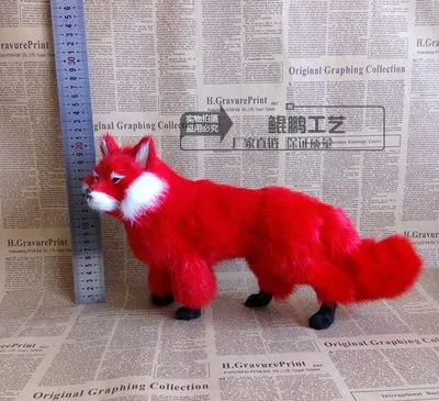 

Fox stands up and poses as fairy black white Red fox spirit girlfriend presents on animal model home decoration crafts statue