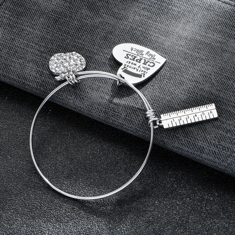 12 шт./лот настоящие герои не носят накидки из нержавеющей стали для учителей