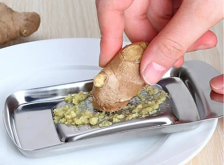 

1PC Stainless Steel Ginger Garlic Wasabi Grater Crusher Garlic Press Device Chopper Cutter Garlics Peeler Kitchen Tools OK 0741