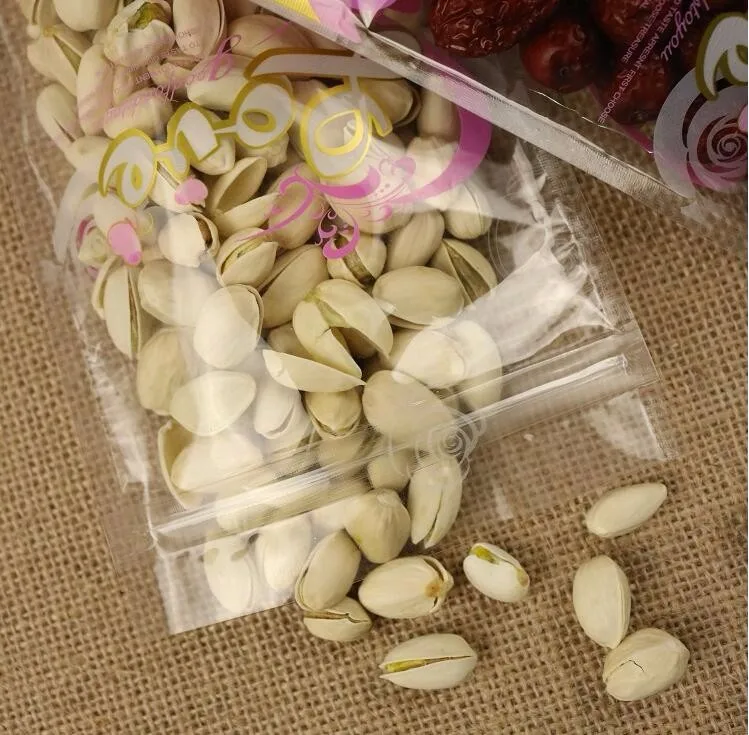 

100Pcs Pink Food Zipper Packaging Bags, Clear Pretty Design Stand Up Pouch for drinks,Beverages Bags,Nuts and Grain