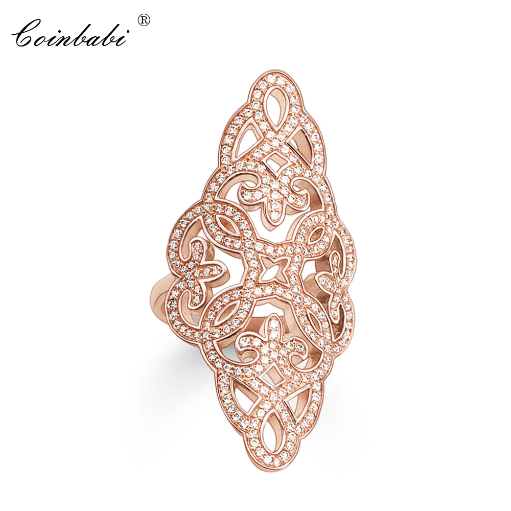 Фото Коктейльные кольца из розового золота с орнаментом стерлингового серебра 925