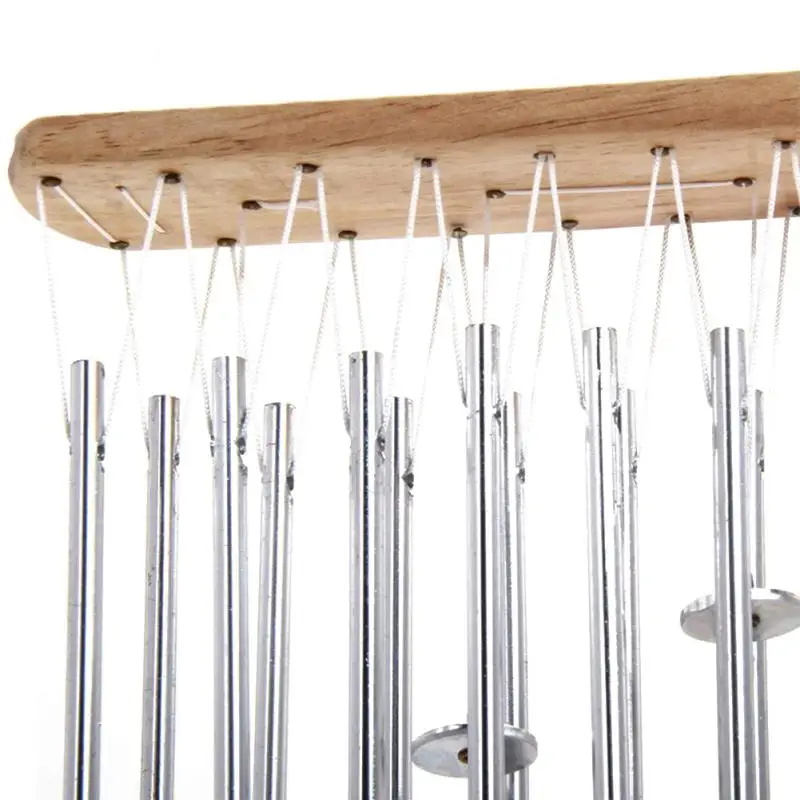 Расслабляющие деревянные медные трубы колокольчики приносят серебристый звук в