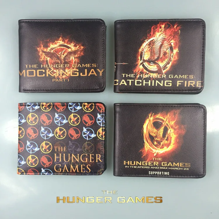 The movie hunger games около трех значков разделяющая птица смеется над кошельком Голодные
