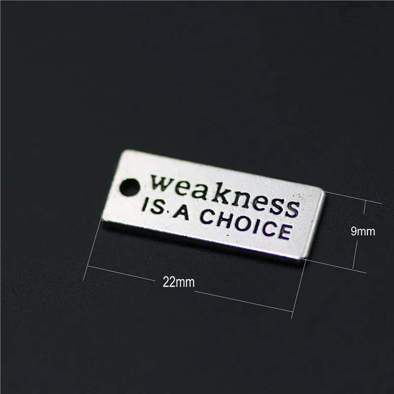 

High Quality 20 Pieces/Lot 9mm*22mm Antique Silver Plated Metal Tag Weakness Is A Choice Fitness Message Charms For Diy Making