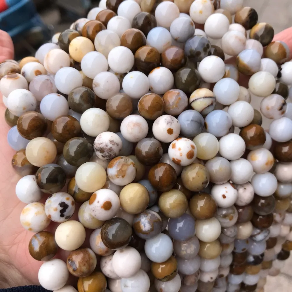 Оптовая продажа натуральный круглый пятнистый Австралийский камень Noreena Jaspers