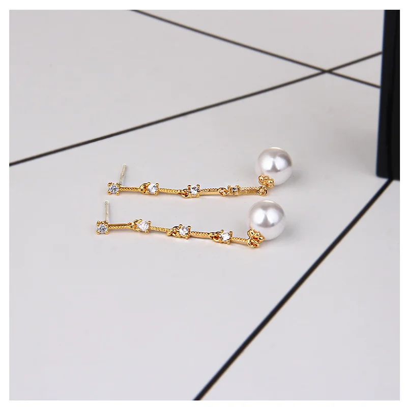 

Maple 2000 Korean-style Pearl earrings, long earrings, women's micro-zircon anti-allergy earrings wholesale