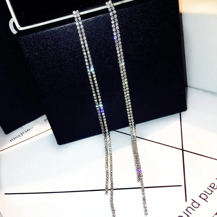 Женские серьги кисточки с кристаллами золотого и серебряного