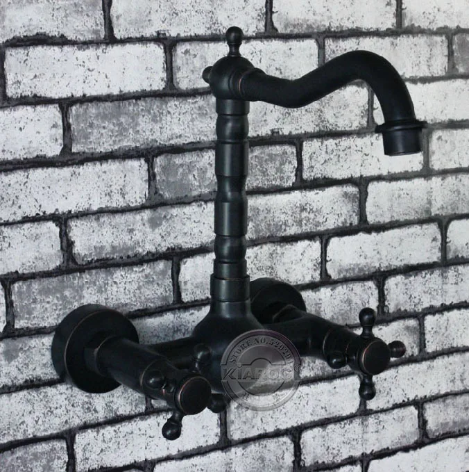 

2 hole Double handle Oil Rubbed Bronze Wall Mounted 4 inch centerset bathroom basin/bathtub faucet.Black swivel sink Mixer Tap