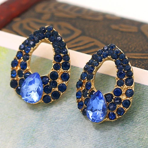 Роскошные темпераментные женские серьги с синими кристаллами гвоздики в форме