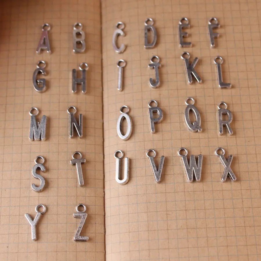 

Free shipping 52pcs/lot Alloy Ancient Silver Plated Cartoon English Letters of Alphabet Shape jewelry charm diy necklace pendant