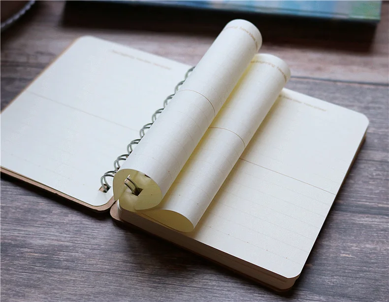 A7 Cute little animal notebook Hard surface iron ring hand holding portable notepad Student notebook