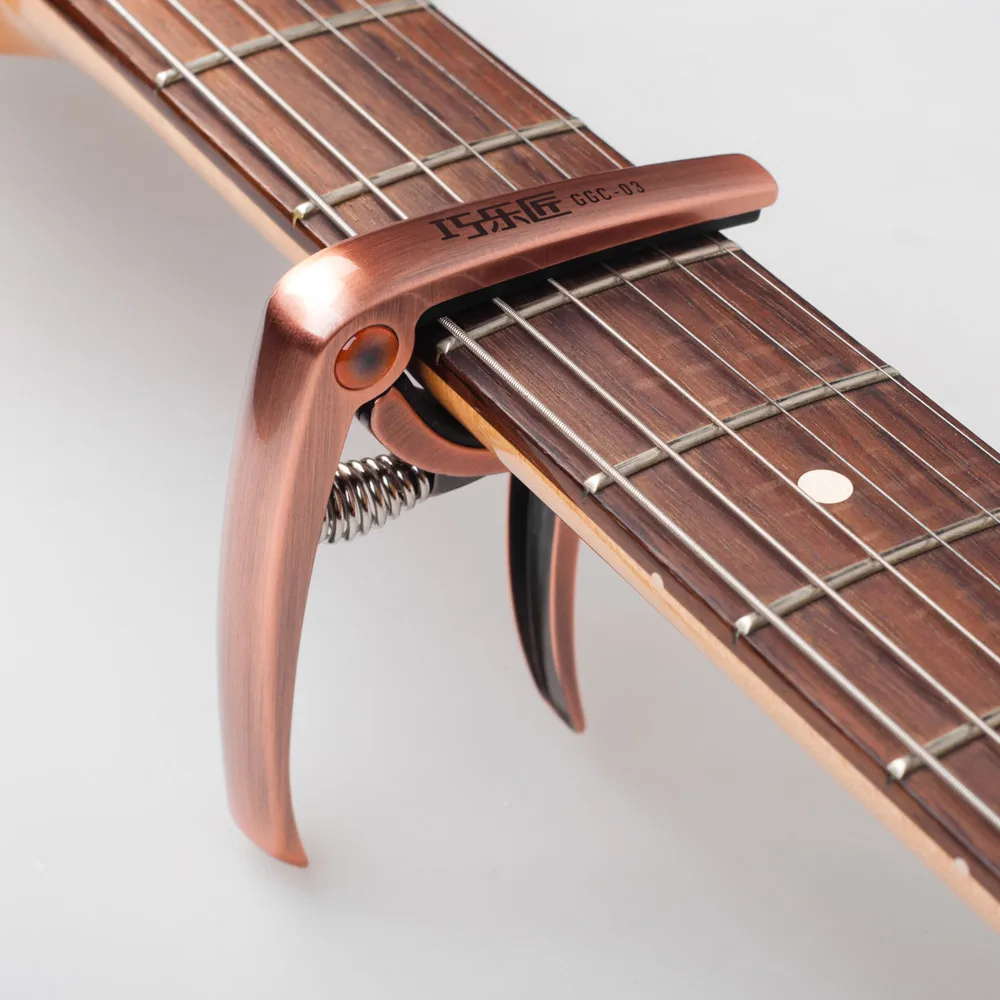 

Guitar Capo Clamp Zinc Alloy with Silicon pad for Acoustic Electric Guitars Bass Ukulele String Instrument Parts