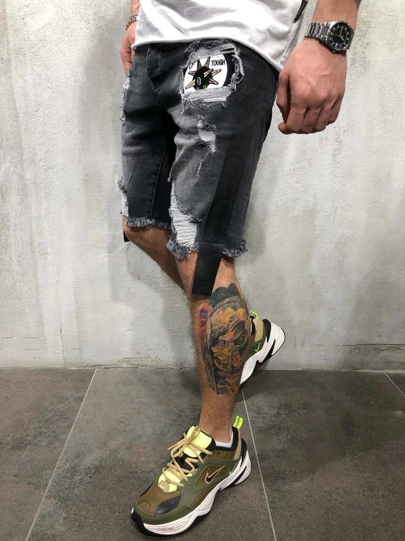 Мужские джинсовые шорты с вышивкой свободные из денима дырками в стиле хип хоп