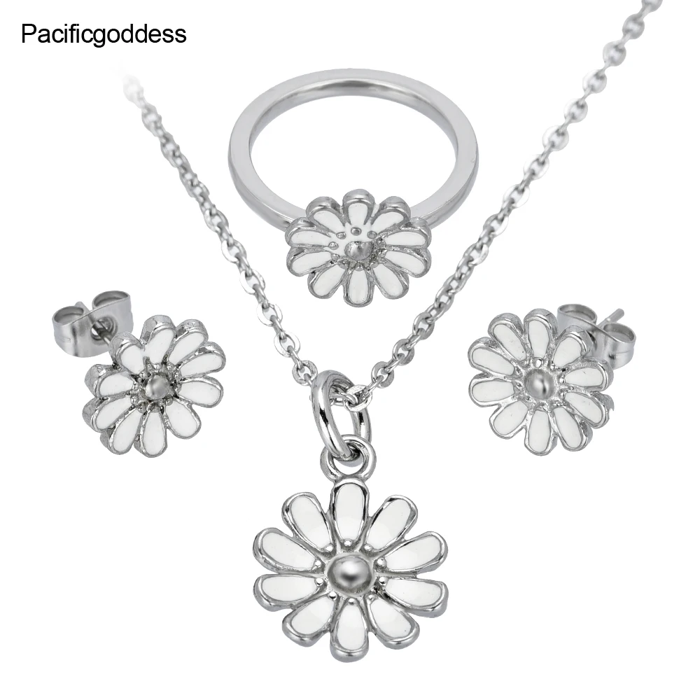 

earrings necklace and rings set in stainless steel jewelry