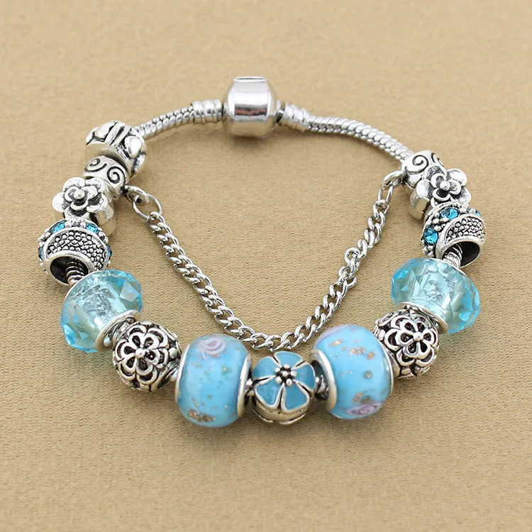 Женский браслет из голубого хрустального стекла посеребренный в форме лотка