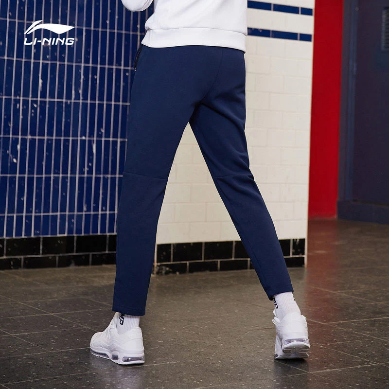 Мужские тренировочные штаны Li-Ning спортивные из 63% полиэстера с подкладкой хлопка