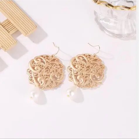 e 1184 European and American retro palace national wind hollow round earrings exaggerated geometric carved water drops pearl ear | Украшения