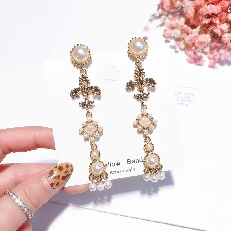 Винтажные длинные сережки с кисточками новая мода цветок вьющимся стеблем